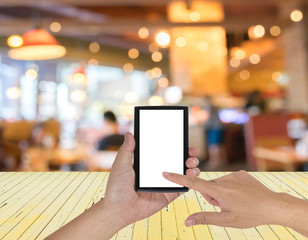 Empty wood table and Coffee shop blur background with bokeh imag