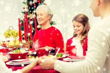 smiling family having holiday dinner at home