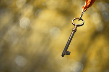 Hanging key in the air - success idea