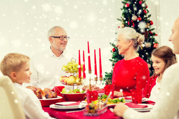 smiling family having holiday dinner at home