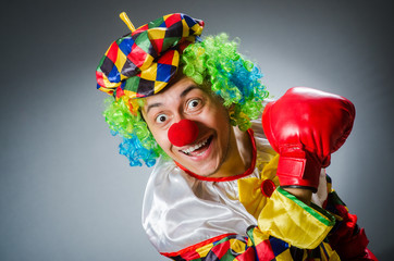 Funny clown in comical concept