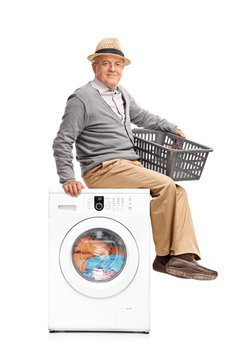 Senior man waiting for the laundry