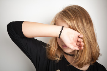 Fototapeta premium Blond teenage girl in black modern tattoo chokers