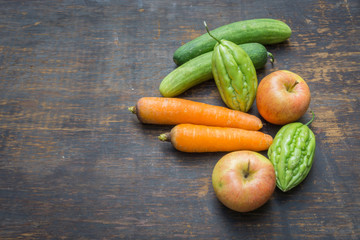 Vegetables isolated on a wood background
