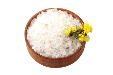 Fototapeta na wymiar sea salt and yellow flowers in a wooden bowl isolated on white background