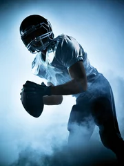 Fotobehang american football player silhouette © snaptitude