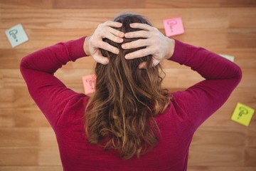 Man with hands standing in front of sticky notes