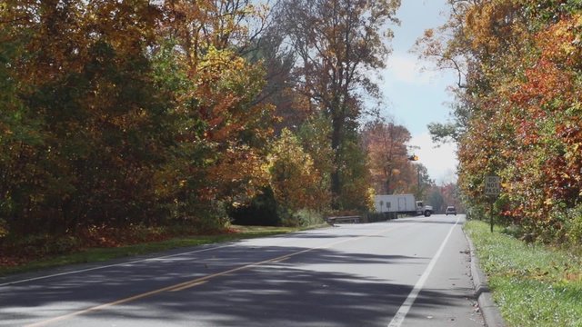 A two-lane road in Autumn