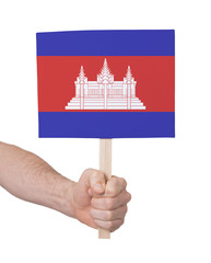 Hand holding small card - Flag of Cambodia