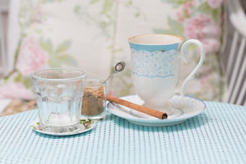 Hot cappuccino coffee in vintage style mug
