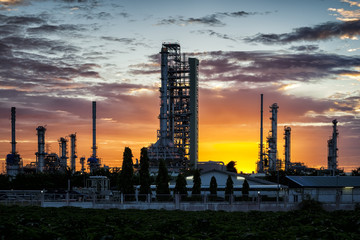 Silhouette of petrochemical industrial plant in sunrise