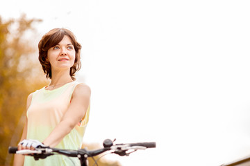 Fototapeta na wymiar woman riding bicycle 