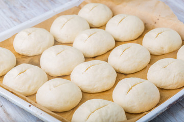 Fototapeta na wymiar Full frame image of buns bread dough ready to bake