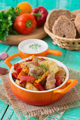 Stewed meat with vegetables.