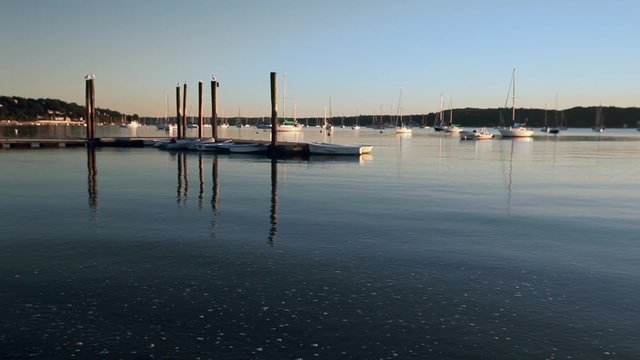 Boats moored at dusk