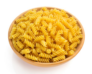 fusilli pasta isolated on white