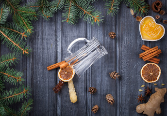 Mulled wine,ingredients.Christmas or winter warming drink. Honey, orange, cinnamon sticks, cloves ,ginger,cardamom and sugar.selective focus