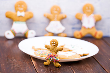 Cookies little men on a wooden table