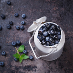Fresh blueberries in a metal can.Healthy food concept.selective focus