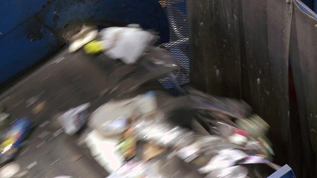 Recycling trash on a conveyor belt