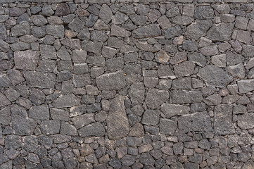 dunkle Steinmauer