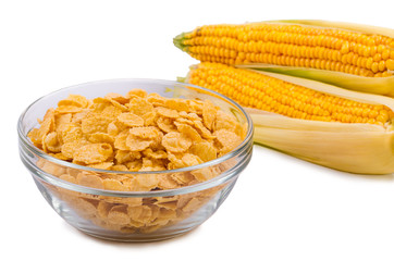 Corn flakes in a plate on a white background