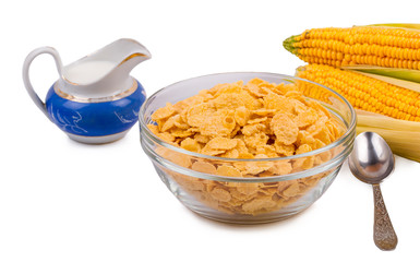 Corn flakes in a plate on a white background