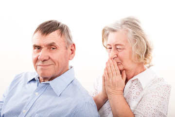 Closeup portrait of smiling elderly couple