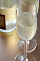 glasses of champagne with bottle