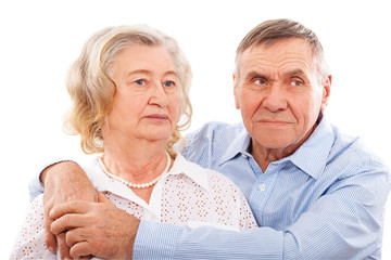 Portrait of smiling elderly couple.