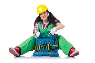 Female workman in green overalls isolated on white
