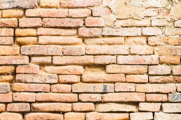 Old weathered brick wall fragment