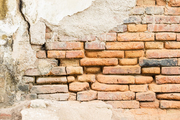 Old weathered brick wall fragment