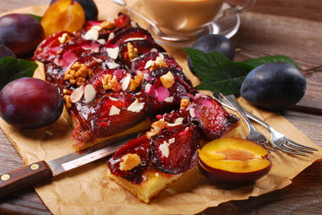 homemade plum cake with walnuts and almonds