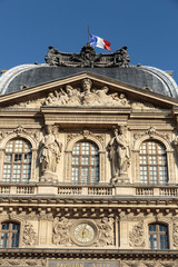 Obraz premium Paris - The Louvre Museum. Louvre is one of the biggest Museum in the world, receiving more than 8 million visitors each year.