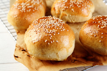 Close up Tasty Burger Buns on Wire Rack