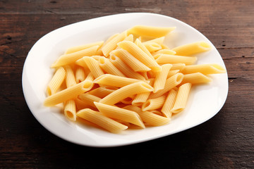 Plain Boiled Penne Pasta on White Dish