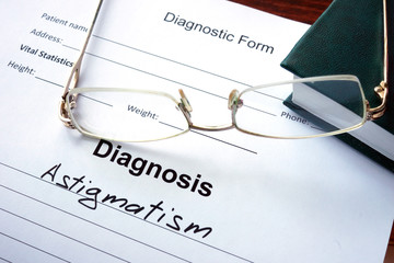 Diagnosis list with Astigmatism and glasses. Eye disorder concept.