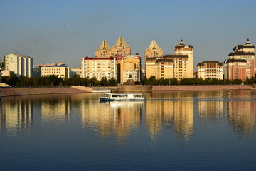 Modern buildings in Astana, Kazakhstan, reflected in the Ishim river
