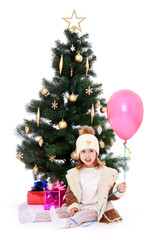 little girl at the Christmas tree