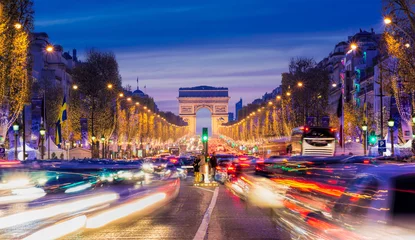 Rolgordijnen Avenue des Champs-Elysees with Christmas lighting leading up to the Arc de Triomphe in Paris, France © FelixCatana