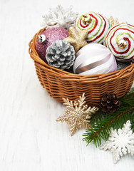 basket with christmas baubles