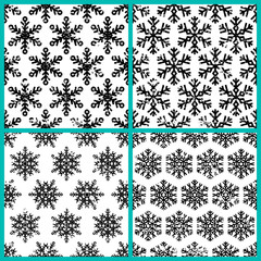 Set of hand drawn vector seamless pattern with black snowflakes