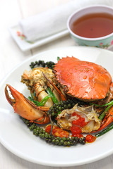 stir-fried crab with green kampot pepper, cambodian cuisine