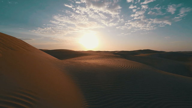 Close shot of the side of a large dune in the Arabian desert