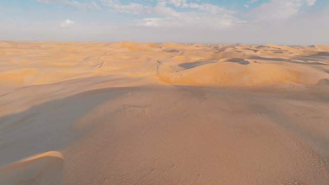 Revealing horizon over sand dunes in Arabian desert