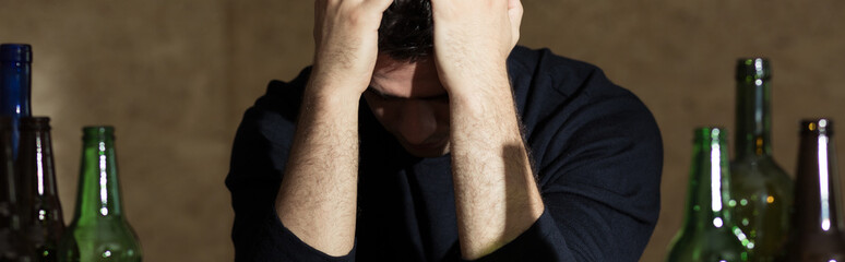 Man and bottles of beer