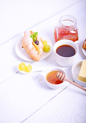 Fresh fruit croissant on white background