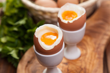 Boiled eggs on a wooden background