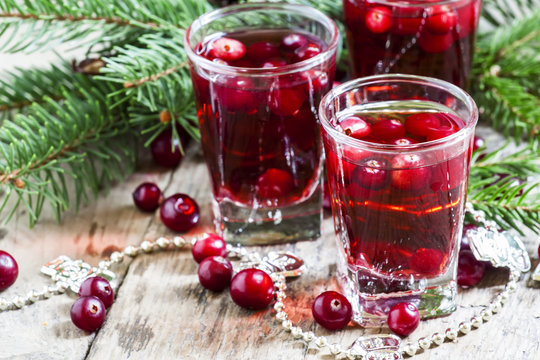 Cranberry drink on Christmas background, selective focus